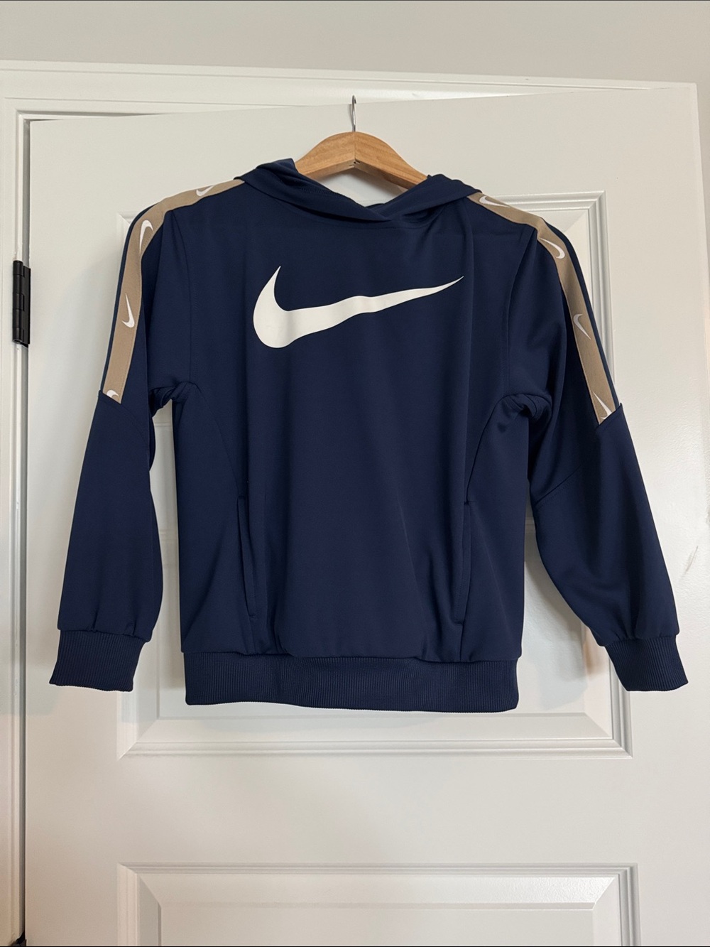 Nike Kids Navy Hoodie with White Swoosh and Tan Shoulder Stripes